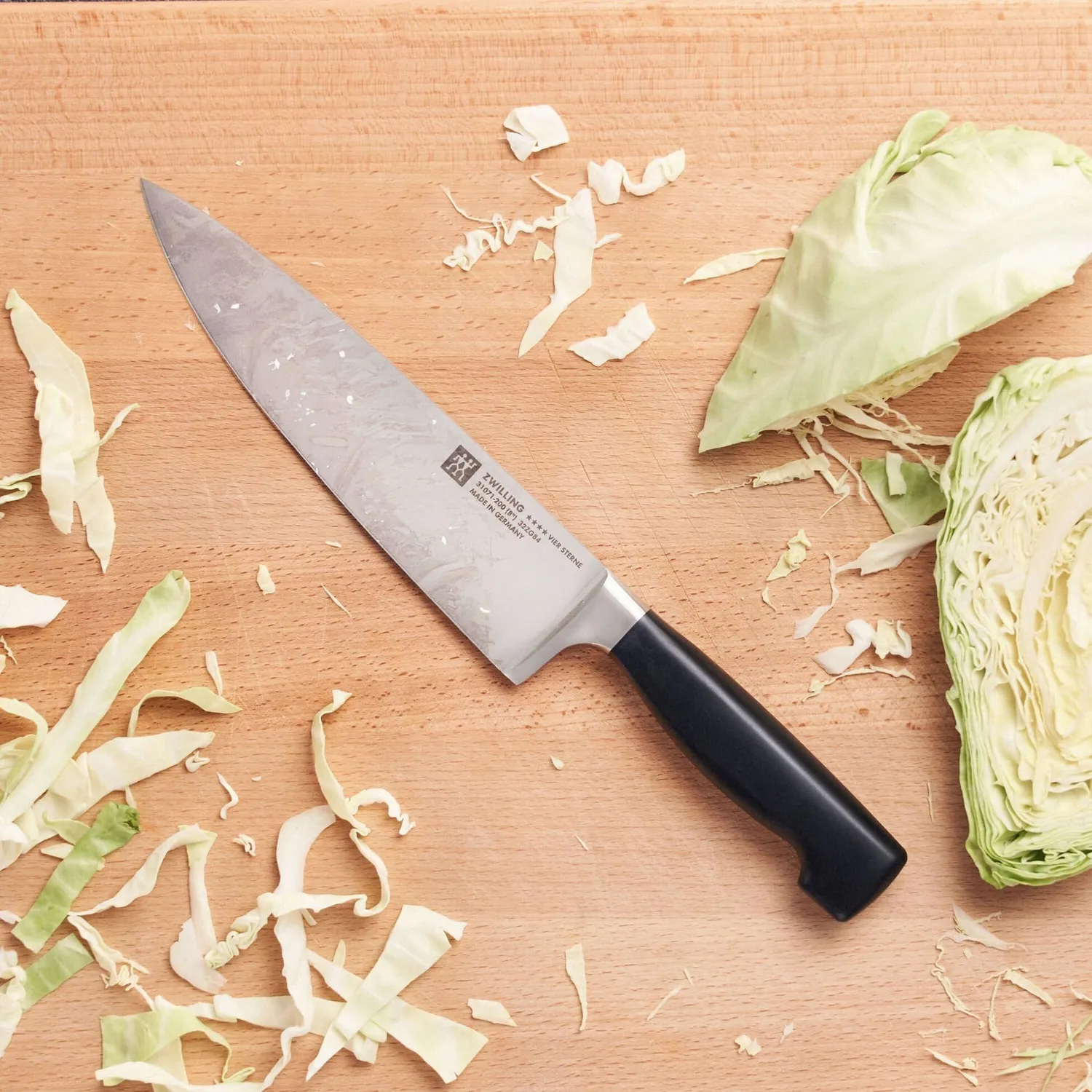 Zwilling Four Star coltello da chef 20 cm acciaio forgiato
